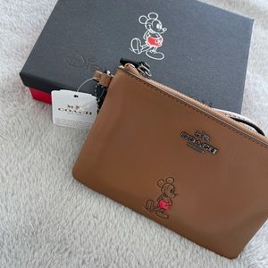 COACH • Tan Disney wristlet